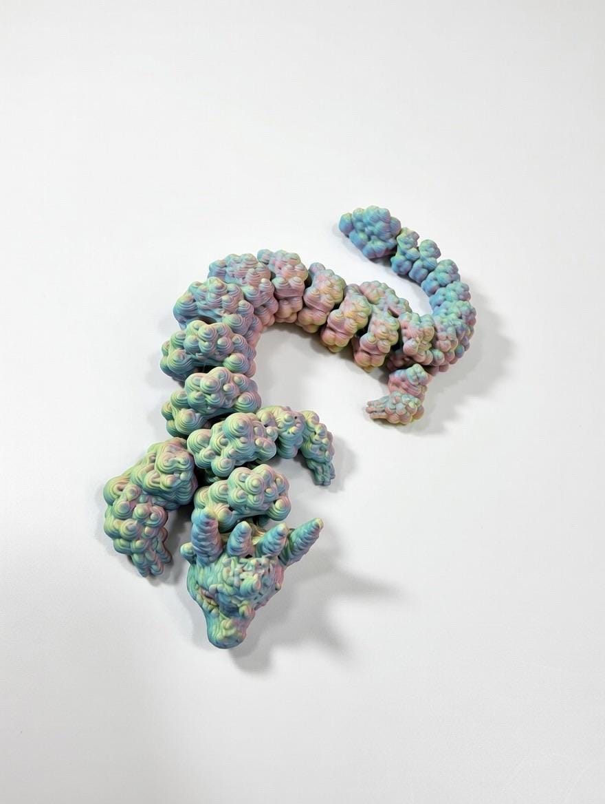 Articulated Bubble Dragon – 3D Printed UV Reactive Pastel Fidget Toy