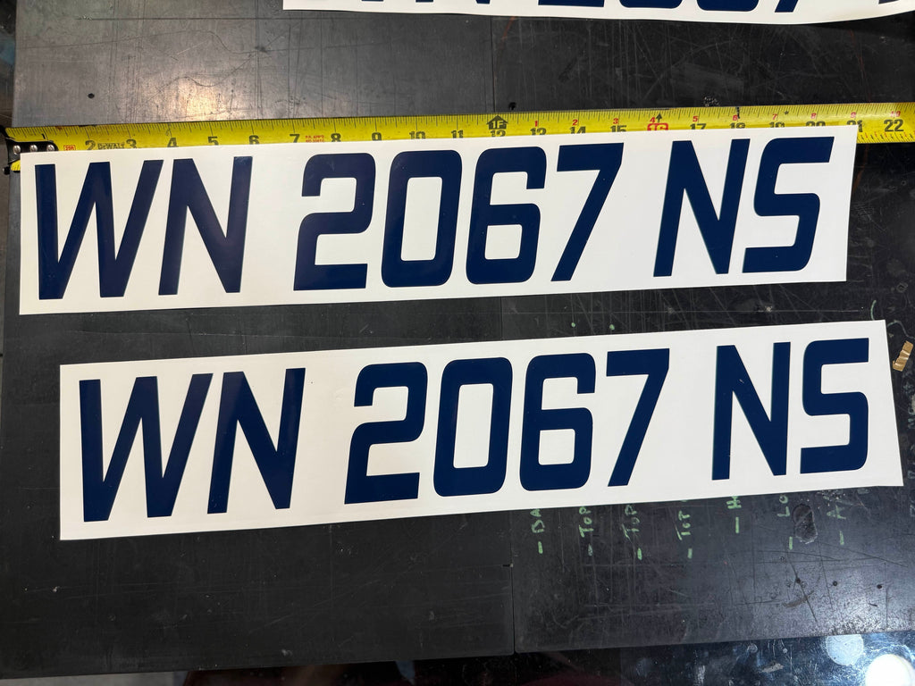 Boat registration number strips shown at full length, roughly 21 inches overall