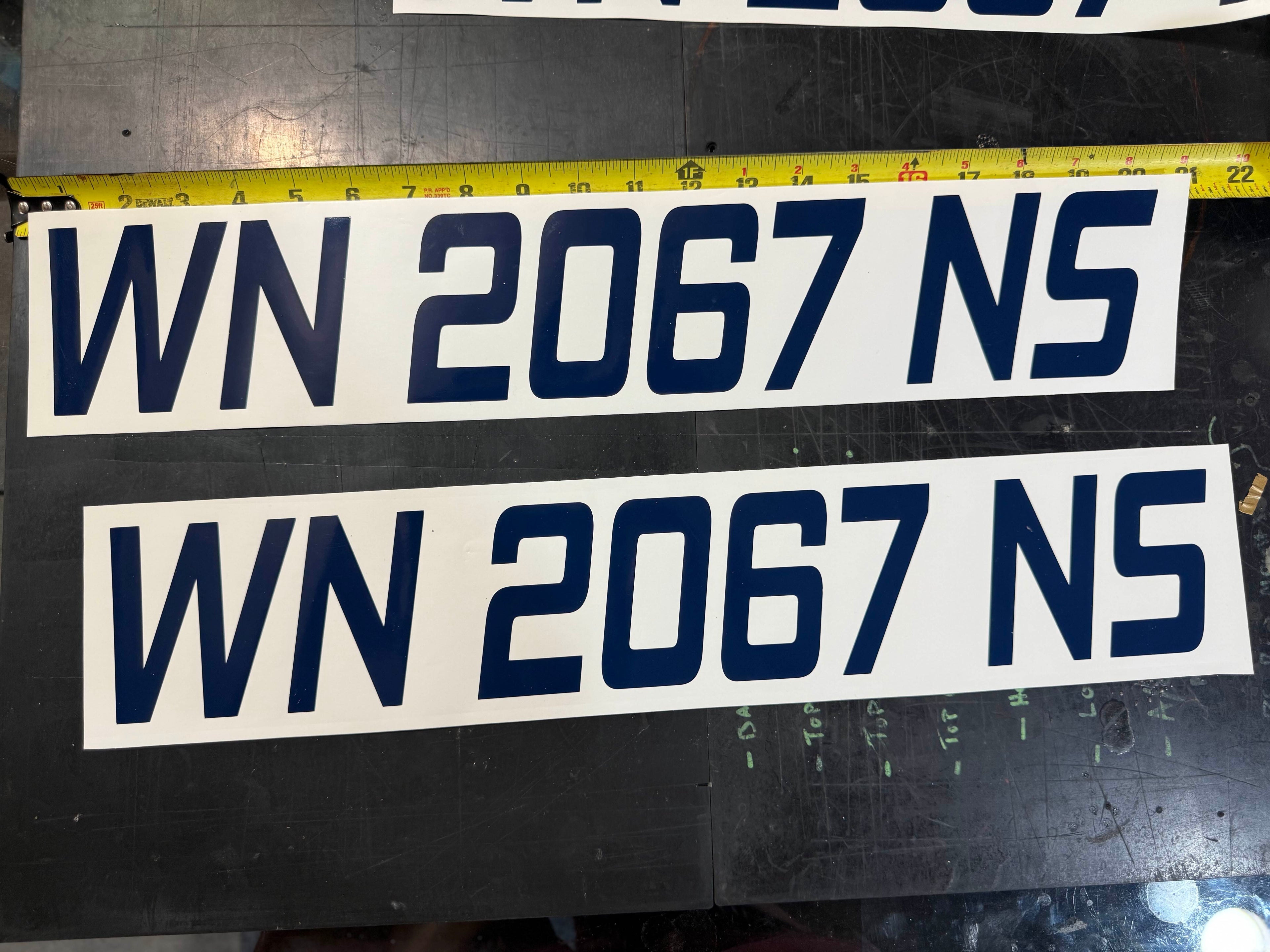Boat registration number strips shown at full length, roughly 21 inches overall