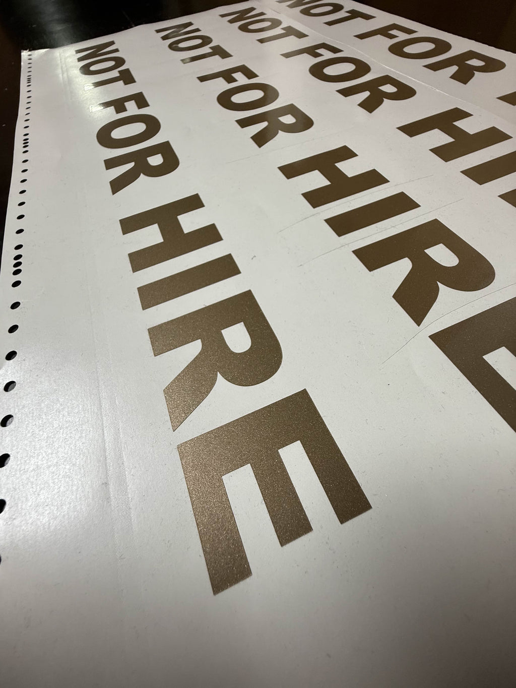NOT FOR HIRE decals in gold metallic vinyl, cut and ready to ship