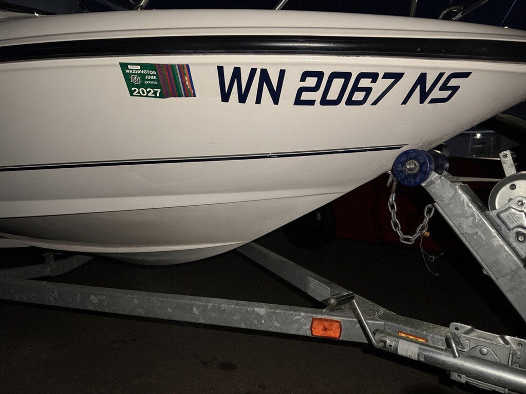 Washington boat registration numbers installed on a hull - 3 inch USCG legal, 3M cast vinyl by JZAC Designs