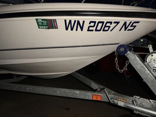 Washington boat registration numbers installed on a hull - 3 inch USCG legal, 3M cast vinyl by JZAC Designs
