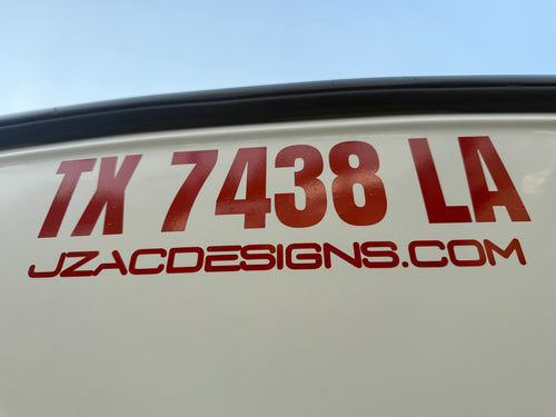 Boat hull lettering in red cut vinyl on a white boat - marine grade 3M cast film by JZAC Designs