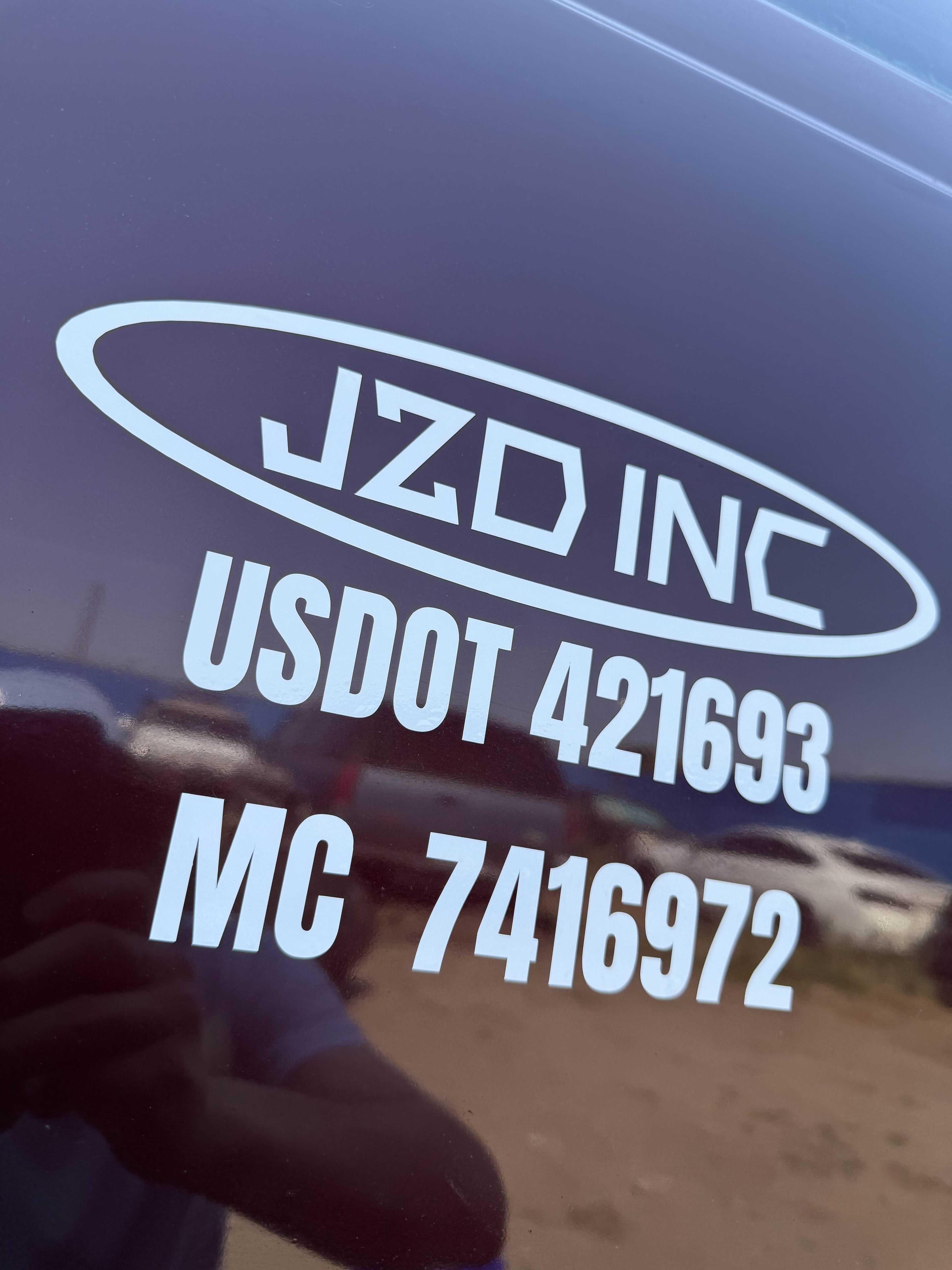 Completed on-site installation - clean vehicle door lettering, Spokane WA and North Idaho service area