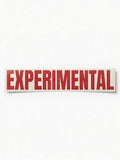 EXPERIMENTAL placard in bright red vinyl