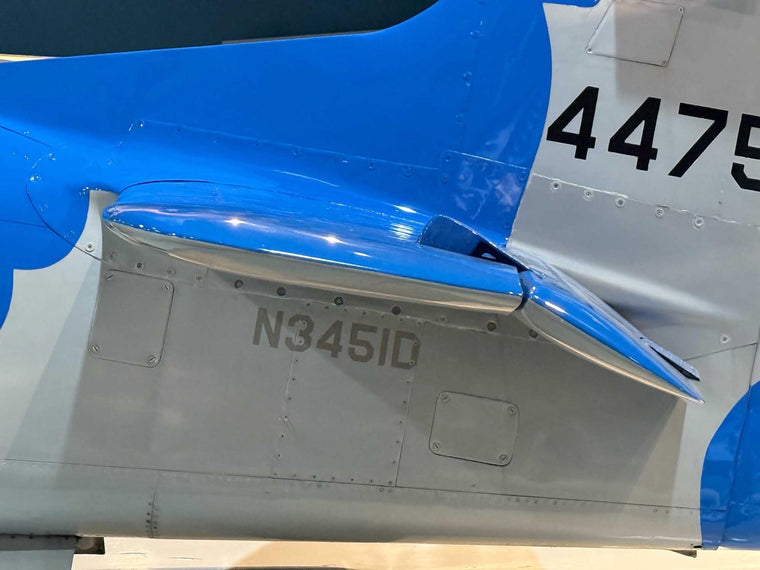 Aircraft N-number lettering applied to a blue and silver airframe - 3M cast vinyl, 14 CFR 45.29 proportions