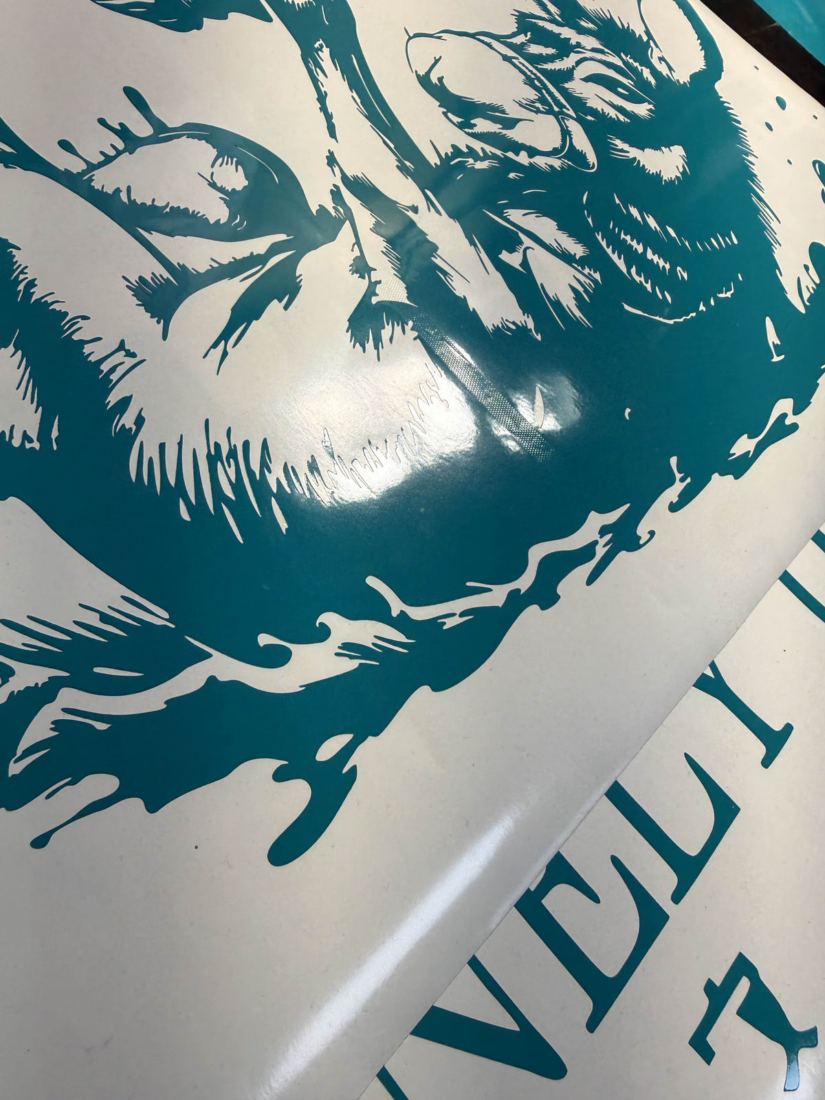 Die-cut custom vinyl sticker prepared on transfer tape