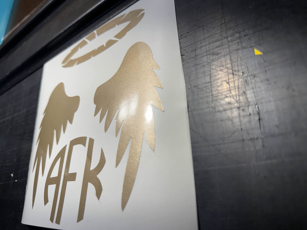 Custom die-cut vinyl lettering ready for application