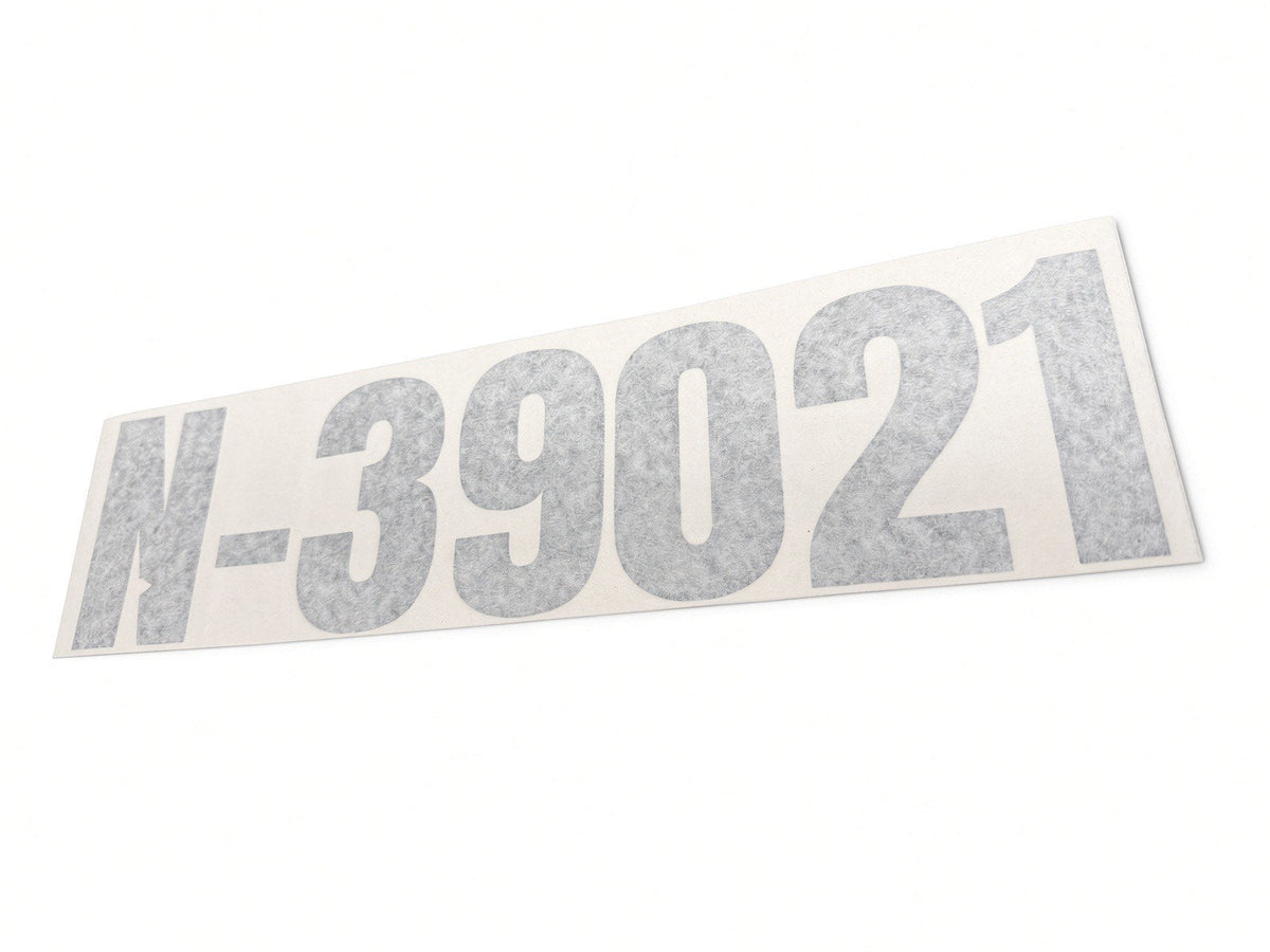 Finished aircraft N-number lettering on an airframe