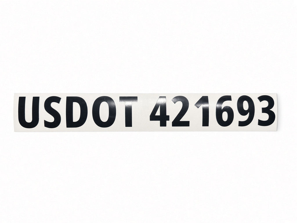 White USDOT number lettering on a commercial truck door