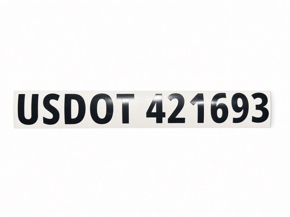 White USDOT number lettering on a commercial truck door