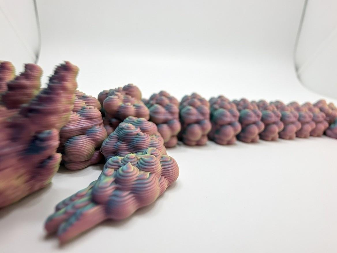 Articulated Bubble Dragon – 3D Printed UV Reactive Pastel Fidget Toy