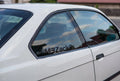 Cut vinyl lettering applied to a vehicle quarter window - rear glass lettering by JZAC Designs